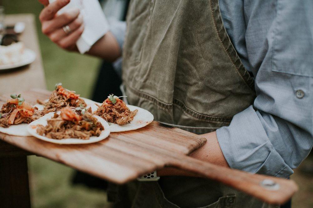 tacos on a wooden tray