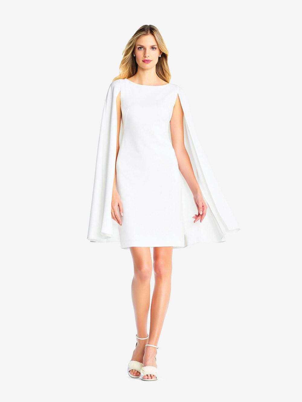 adrianna papell ivory sheath dress with high scoop neckline and cape sleeves for wedding after party outfit