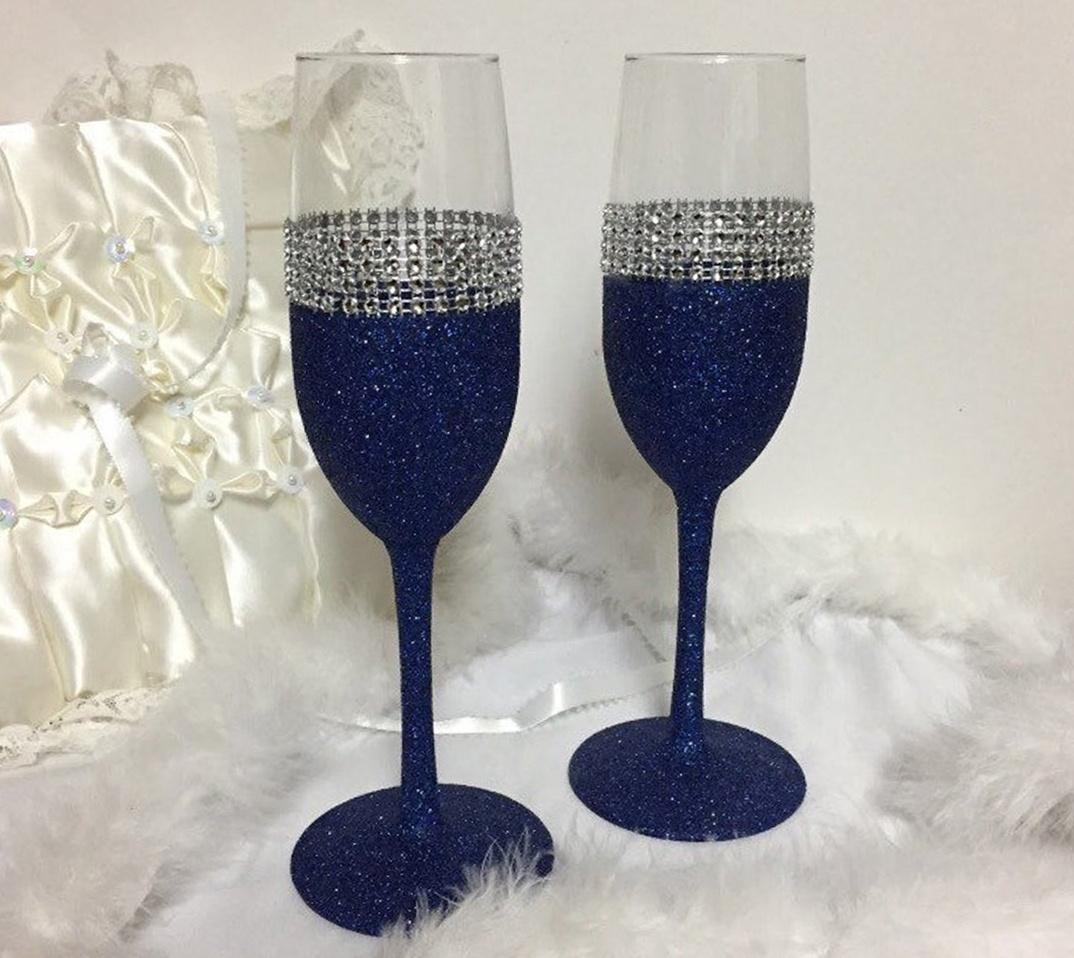 Navy glitter-stemmed wedding champagne flutes