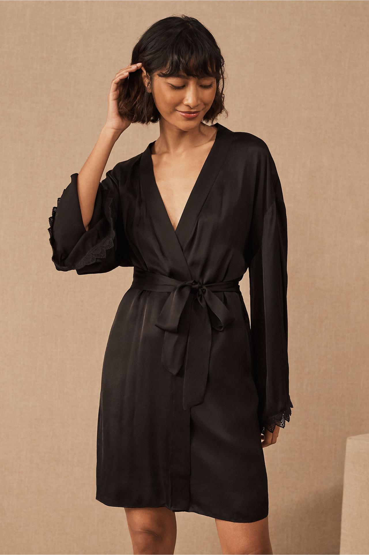 Short black bridal robe with lace trim on sleeves