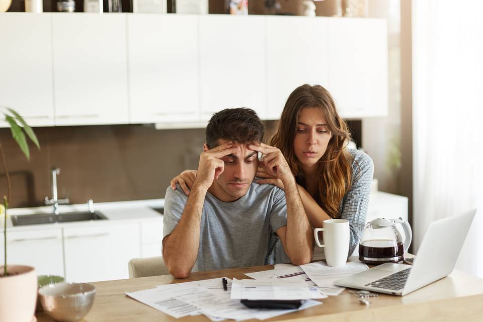 stressed couple after spouse loses job
