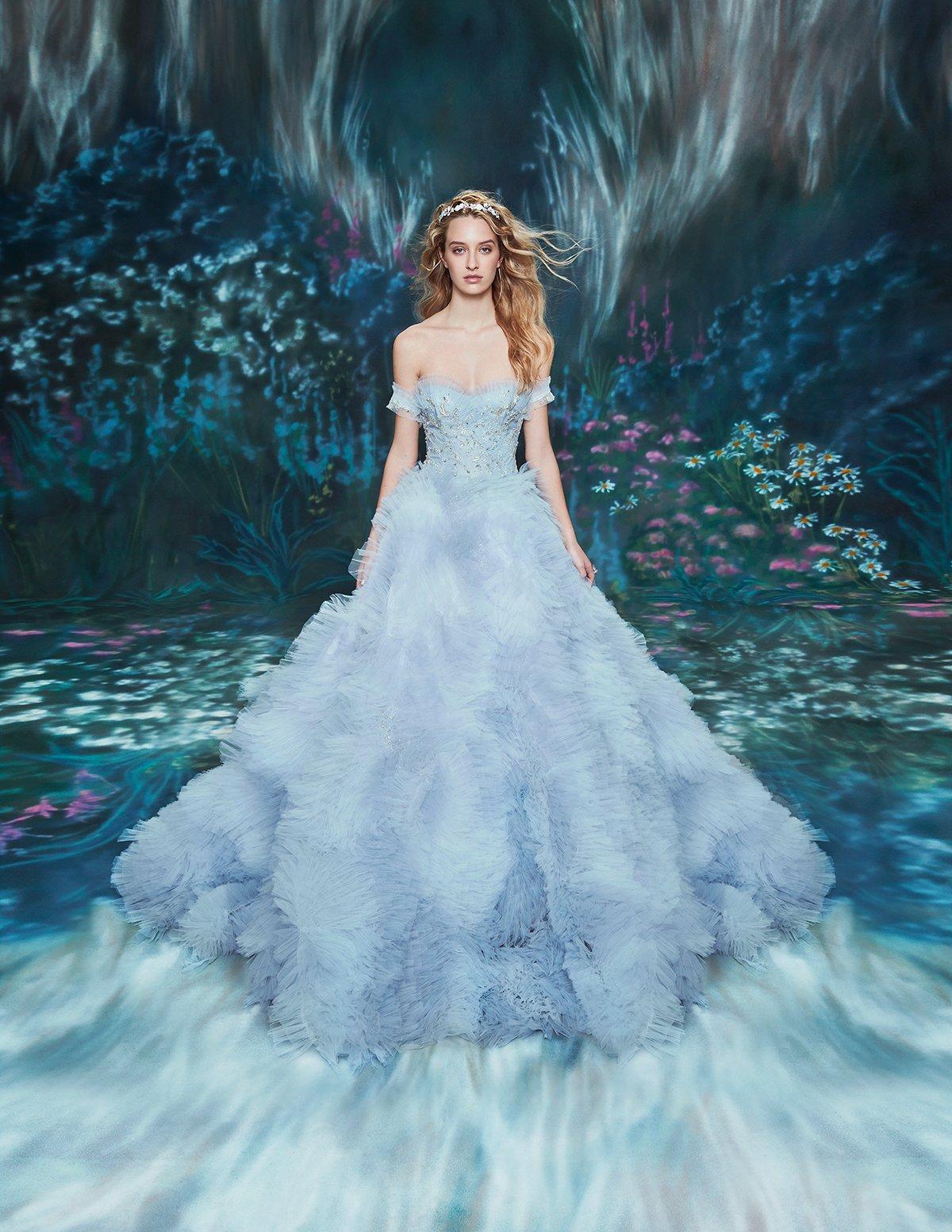 light blue tulle ball gown with skirt made from micro-ruffles and dramatic train