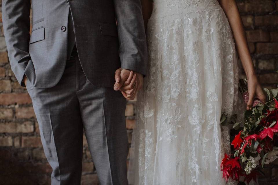 wedding couple holding hands