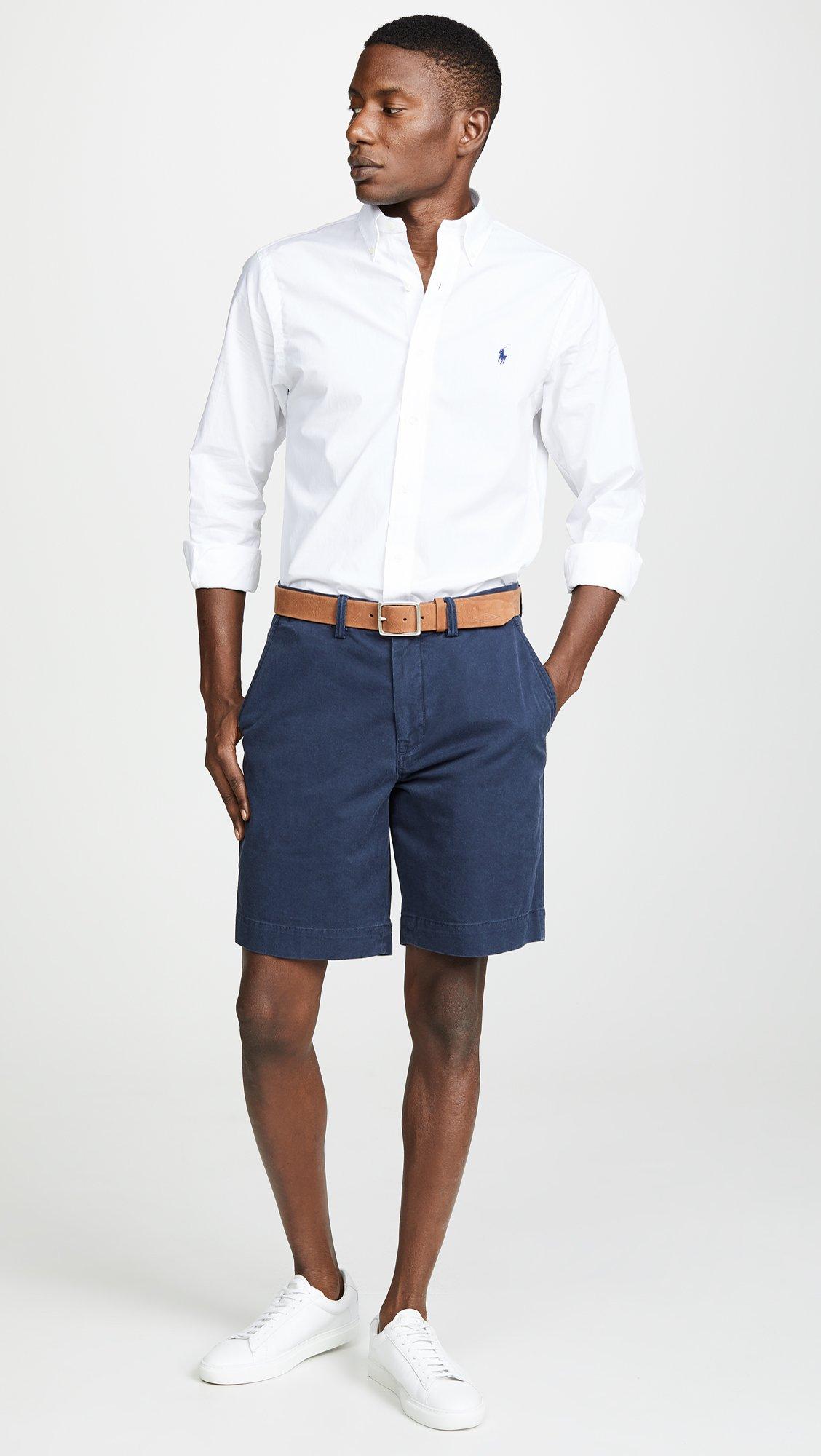 Chino shorts and button-down shirt rehearsal dinner guest outfit