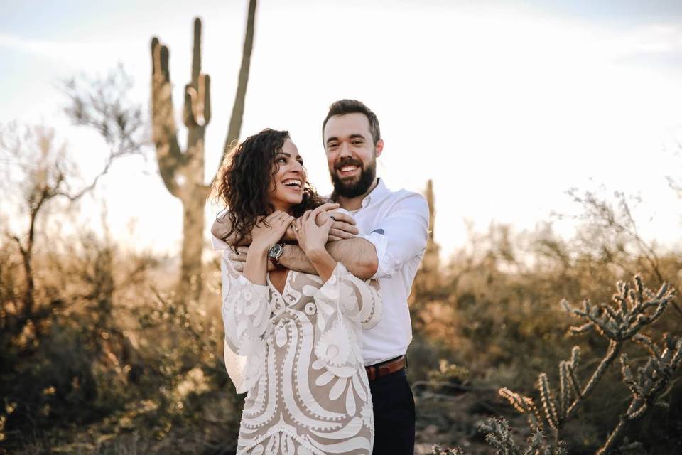 couple posing in desert