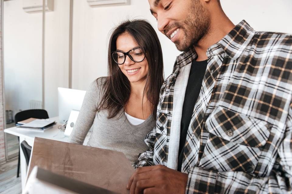 couple looking at album