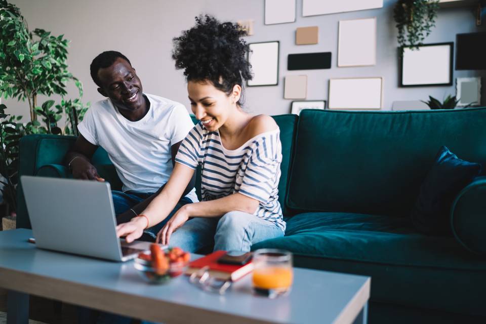 couple looking at a laptop