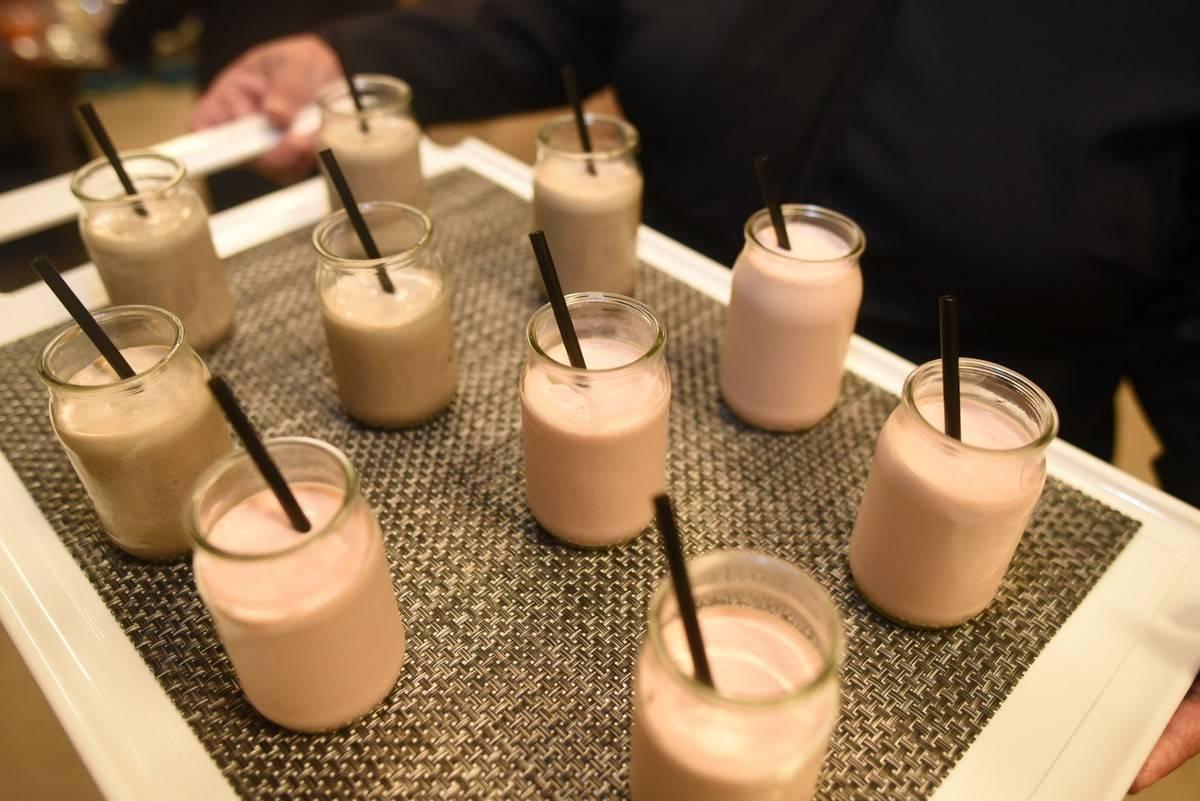 milkshakes in glass jars with straws