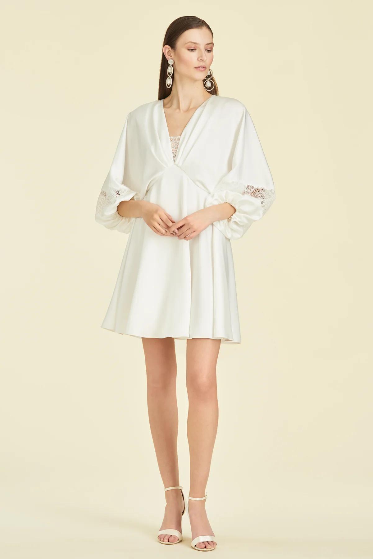 Mini dress with long puff sleeves and trim accents
