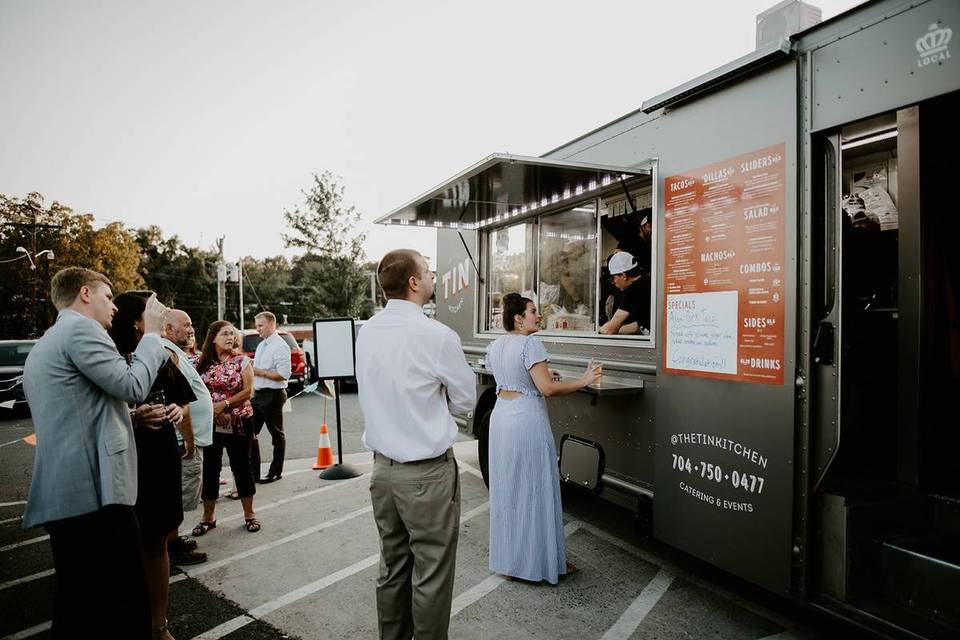people ordering at tin kitchen food truck
