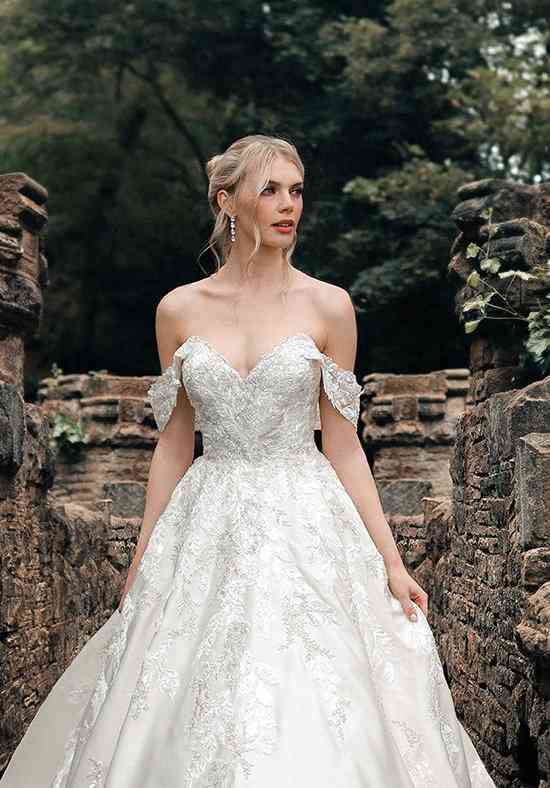 This fairytale @olyamak_wedding A-line wedding dress features a semi-sheer  corset bodice decorated with 3D flowers detailing with a flowing… |  Instagram