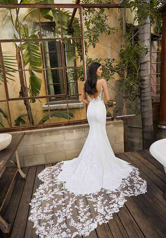 white christmas dresses Venus bridal ensemble featuring ivory satin corset, A-line chiffon skirt  with train, and starry Feyre Sleeves by Boom Blush main image 0