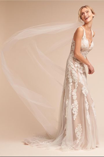 BHLDN	BHLDN Monarch Gown		We love how floral lace appliqué floats down airy, raw-edge tulle, but...