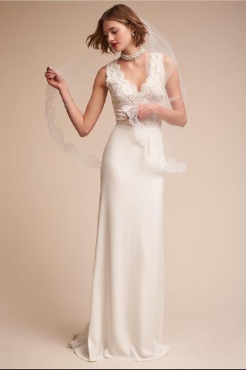 Tadashi Shoji	BHLDN Andora Gown		We’re in love with the back of this gown—a sheer bodice and...