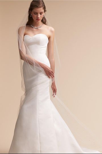 BHLDN	BHLDN Ritz Gown 		This structured satin gown takes center stage with its clean lines,...