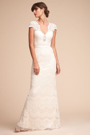 Watters	BHLDN Alice Gown		Playing with the graphic nature of embroidered lace, this design...