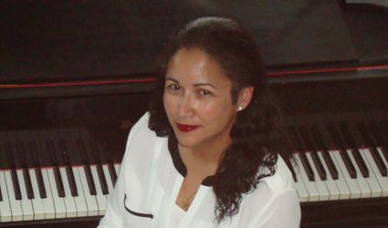 Dr. Alma Batista, Pianist