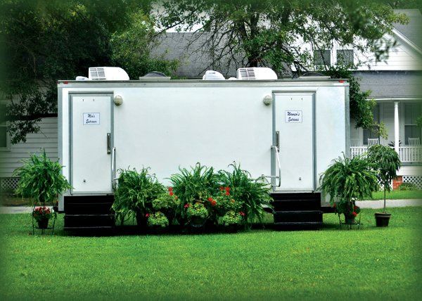 FANCY FLUSH AND FLASH-RESTROOM TRAILERS & PHOTOBOOTH