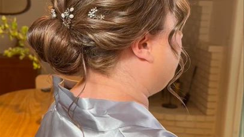 Elegant Low Bun with Hairpiece