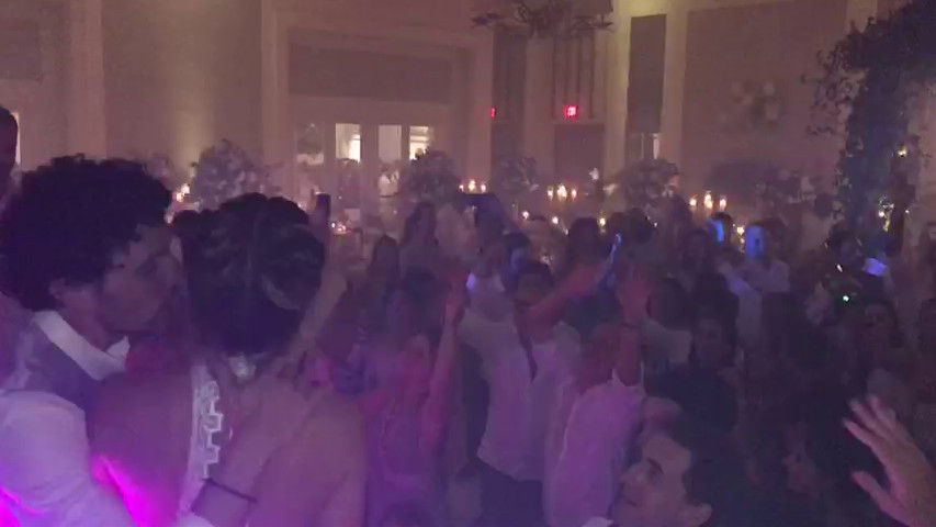 A bride and groom with a CO2 cannon at Baha Mar!  