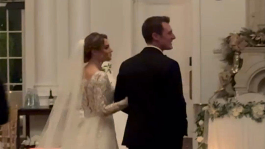 Bride and Groom walking the venue