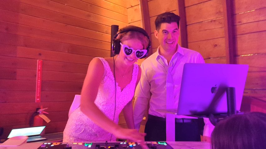 Bride Taking a Turn DJing