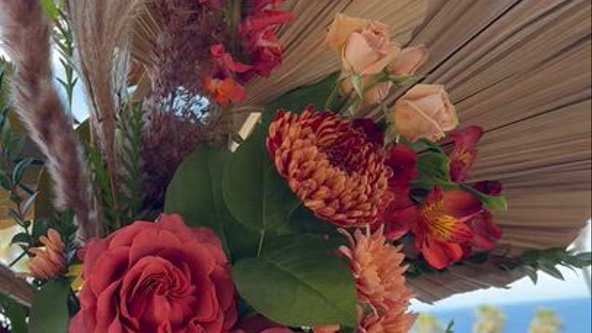 Two piece arch fully covers with flowers