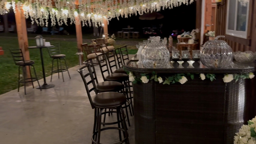 Patio w/Bar. Whiskey Barrel Tables on 12’x50’ Porch
