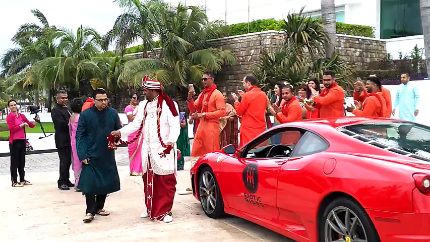 Baraat parade with exotic cars