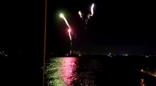 Aerial fireworks display from the sea