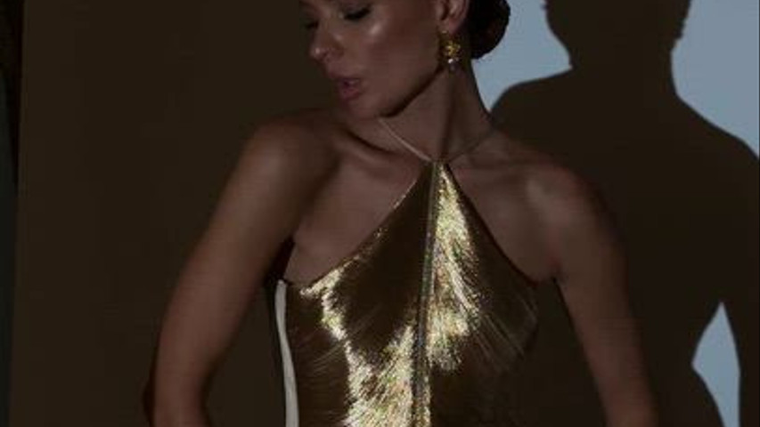 Sleek bun and soft glam makeup 