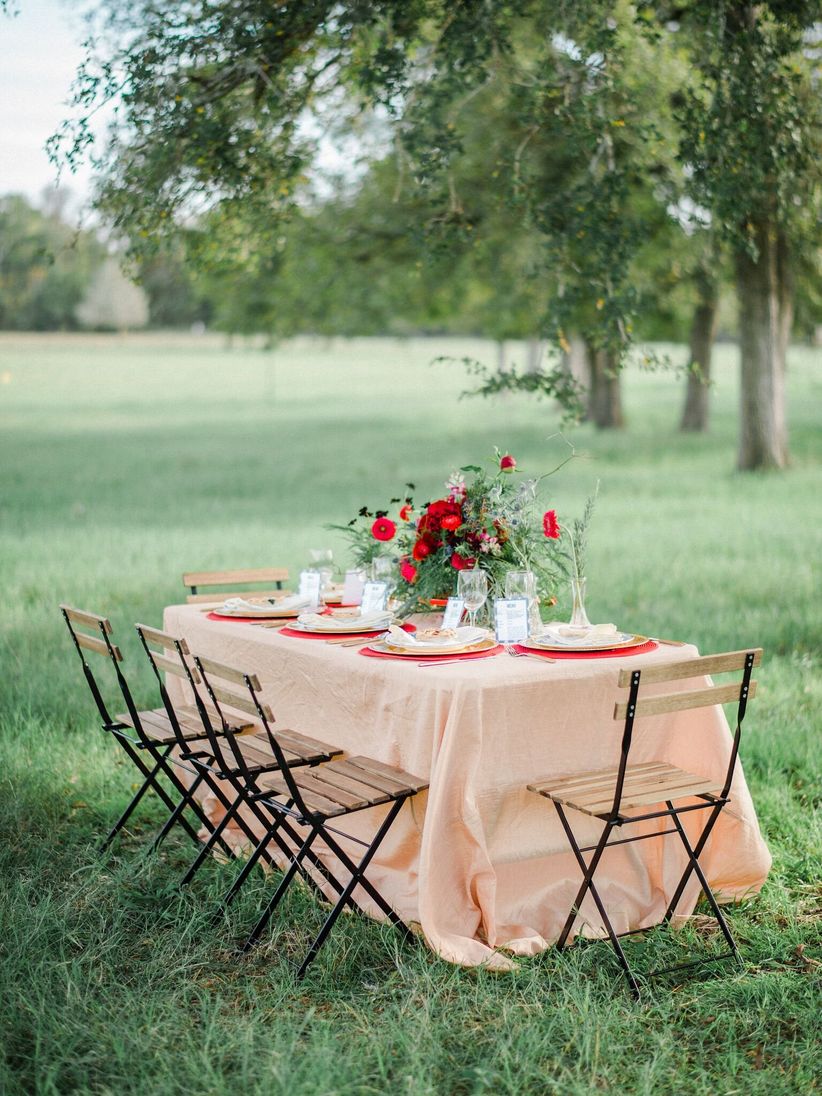 slotted chairs and rustic tablescape 