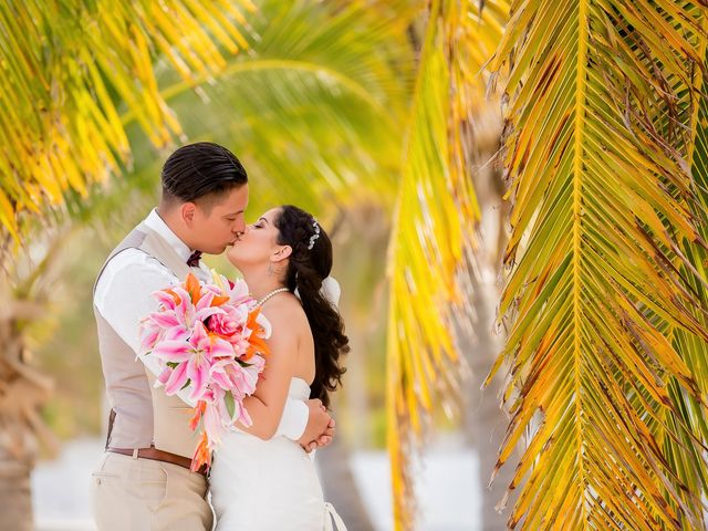 Michelle and Osiel&apos;s Wedding in Belize District, Belize 79