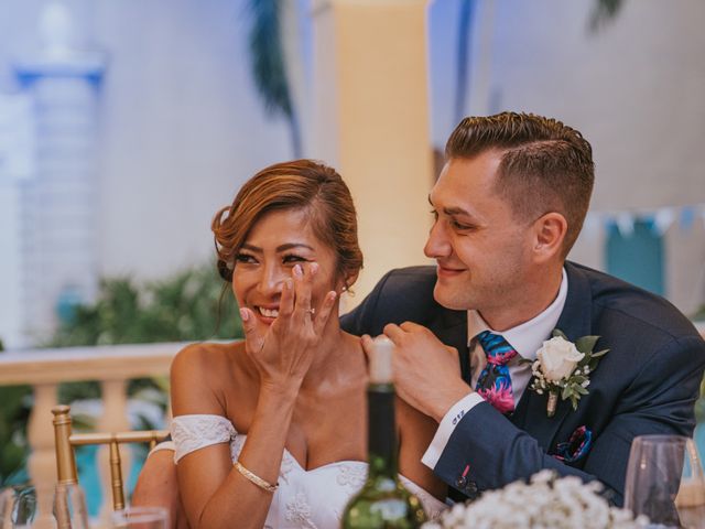 Daniel and Leina&apos;s Wedding in Honolulu, Hawaii 32