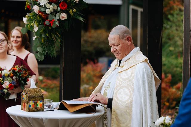 The Reverend Doctor Robert M. McMahon 5
