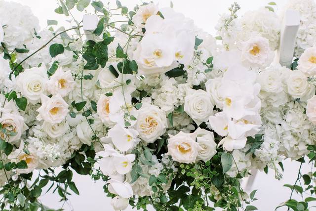 White wreath arranged by a florist in East Greenwich, RI : Busy