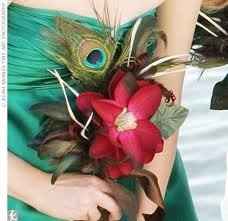 Help need ideas for bridemaids bouquet, peacock theme, cant afford flowers.