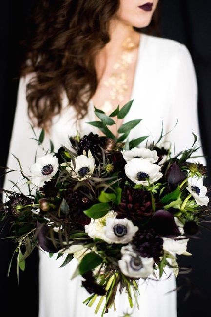 Do dark floral centerpieces give off a somber vibe? 1