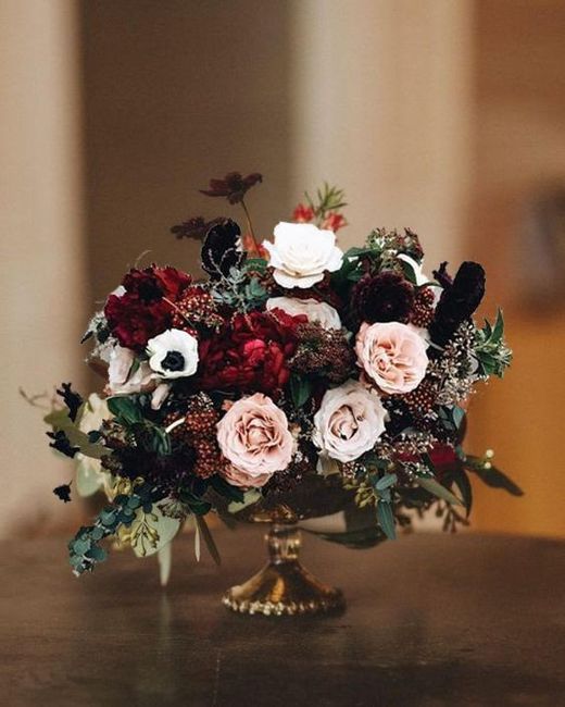 Do dark floral centerpieces give off a somber vibe? 3