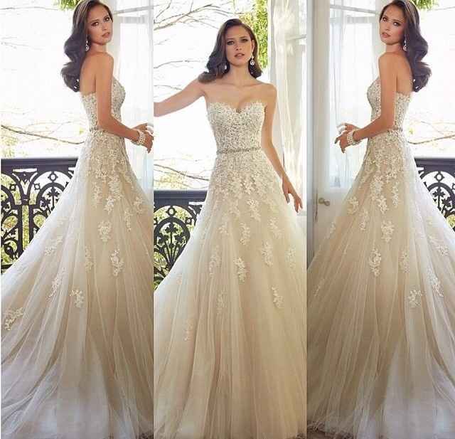 Who is the designer of this gorgeous dress?