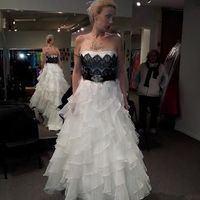 Who's NOT wearing white or ivory?