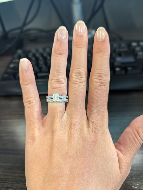 Does anyone have a twisted band diamond engagement ring? And what kind of wedding band did you get? 1
