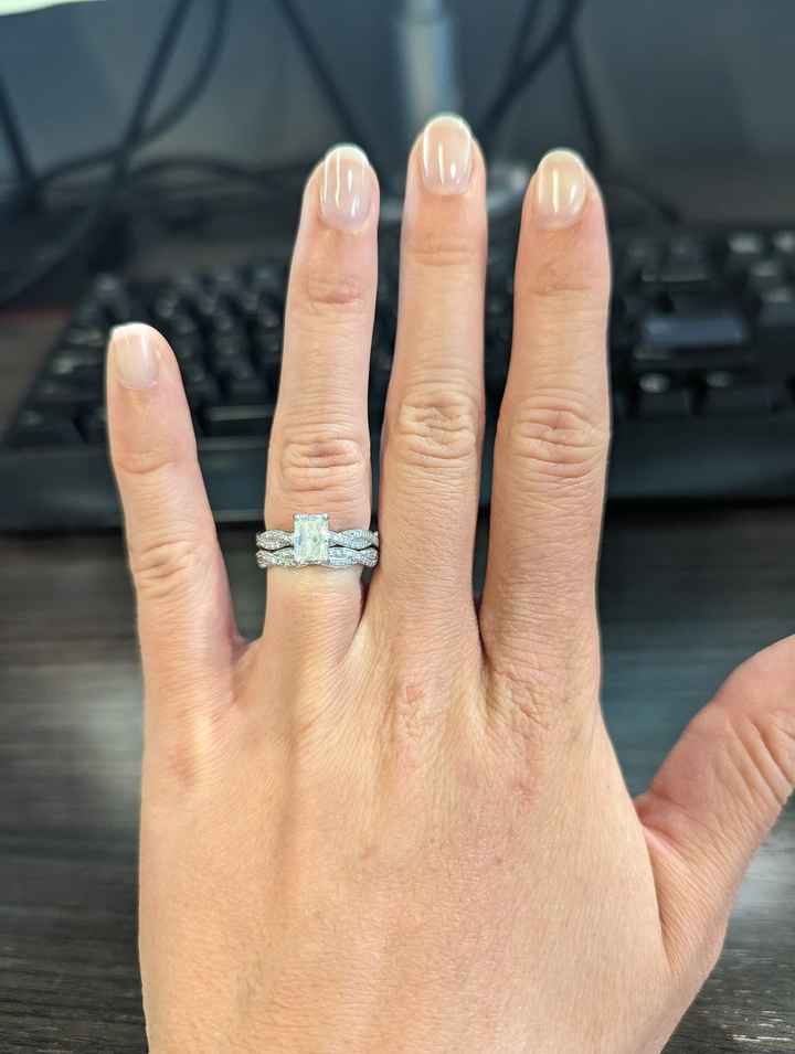 Does anyone have a twisted band diamond engagement ring? And what kind of wedding band did you get? 