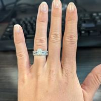 Does anyone have a twisted band diamond engagement ring? And what kind of wedding band did you get? 