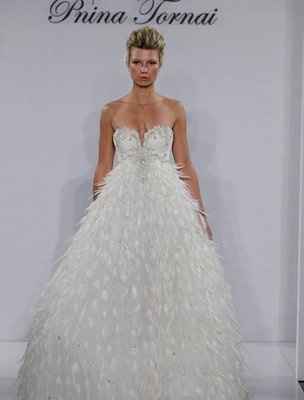If you had an unlimited budget, What is your dream wedding dress ?