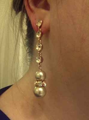 Veil, earrings, and..