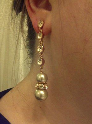 Veil, earrings, and..