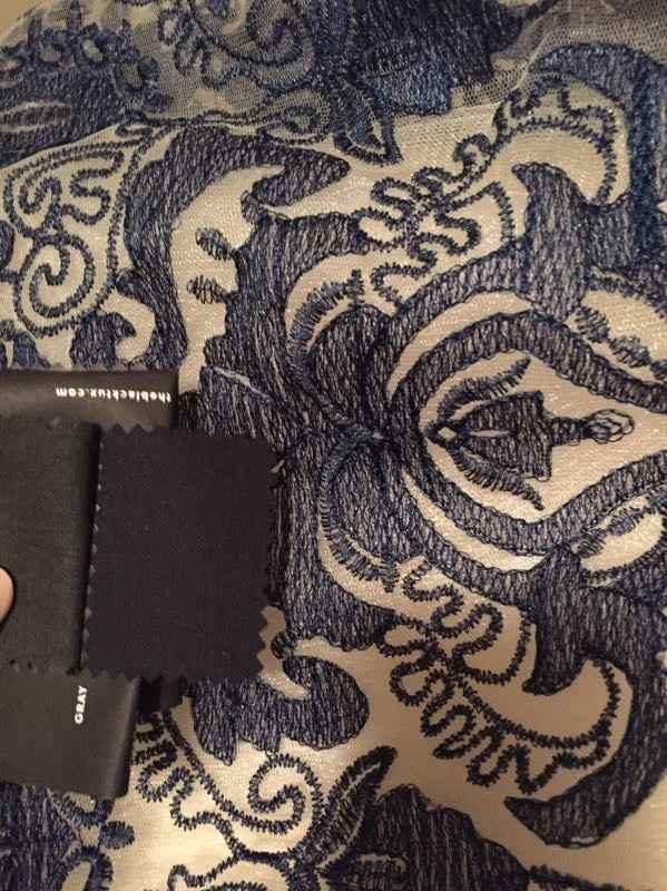 Suit fabric swatch compared to BM dress