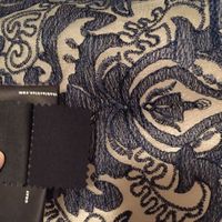 Suit fabric swatch compared to BM dress