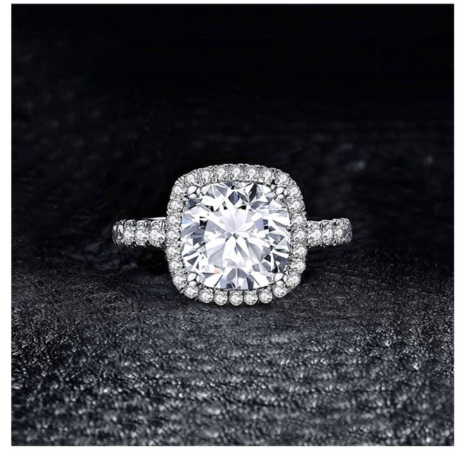 Thoughts on wearing a fake / decoy engagement ring? 6